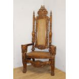 Decorative carved mahogany throne chair with lions masks and rattan seat and back {180 cm H x 92