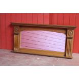 Decorative oak overmantle. {67 cm H x 137 cm W x 14 cm D}.