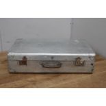 White metal suitcase {20 cm H x 74 cm W x 43 cm D}.