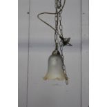 Single hanging light with tulip shade {93 cm H x 16 cm Dia.}.