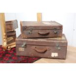 Set of two garduated leather travel suitcases {25 cm H x 56 cm W x 35 cm D}.