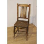 Oak ecclesiastical side chair {90 cm H x 35 cm W x 38 cm D}.