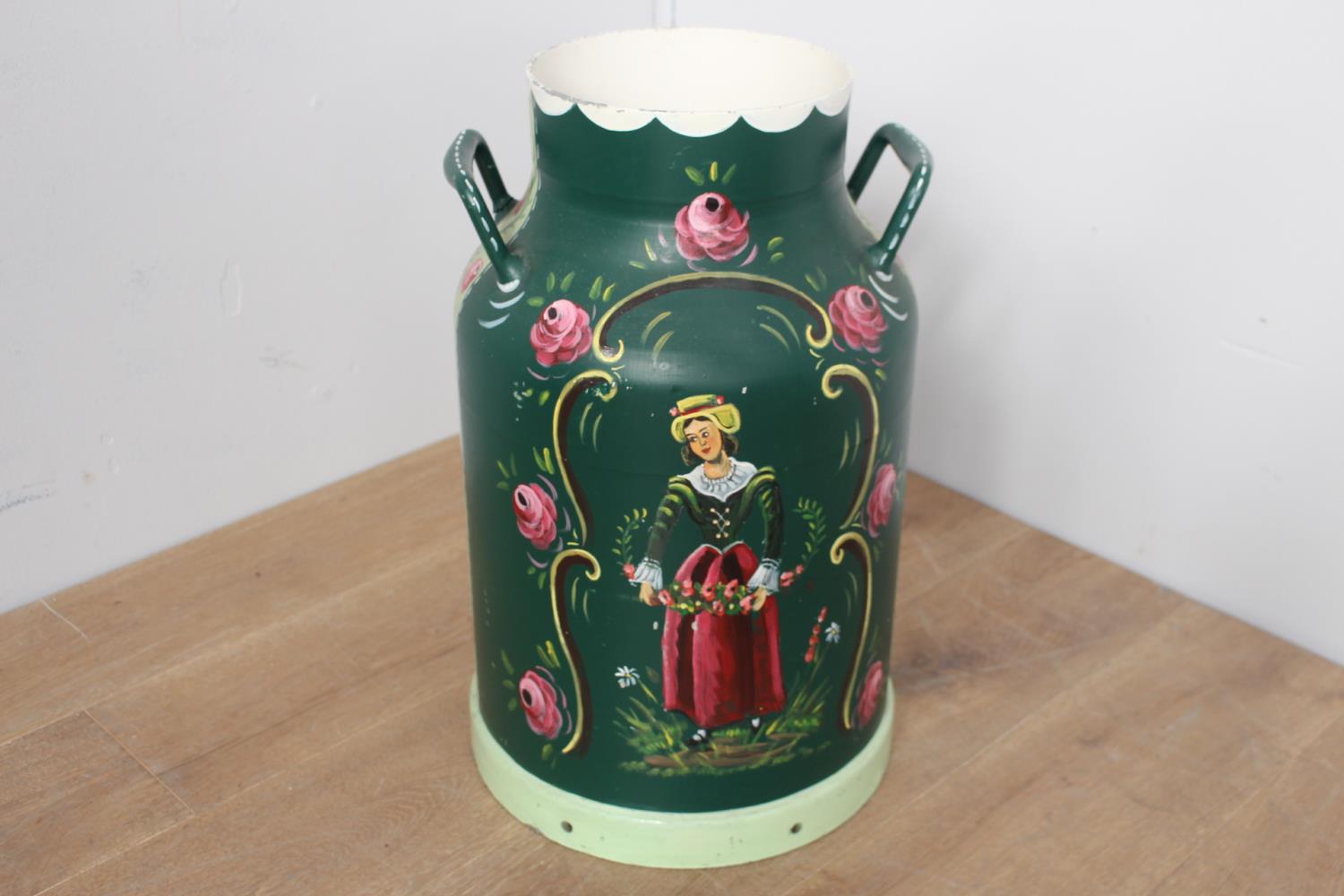 Green metal milk churn with painted floral scene {60 cm H x 36 cm Dia.}.