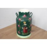 Green metal milk churn with painted floral scene {60 cm H x 36 cm Dia.}.