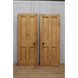 Set of two pine internal doors with brass and black knobs {1978 cm H x 76 cm W}