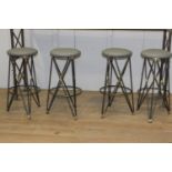 Set of four metal and leather upholstered stools {79 cm H x 39 cm Dia.}.