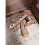 Pair of wooden taps and string holder.