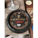 Guinness advertising clock. {22 cm W}.