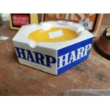 Harp ceramic advertising ashtray {6 cm H x 18 cm Dia.}.