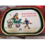 Guinness For Strength pictorial tin plate advertising tray {31 cm H x 40 cm W}.