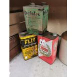 Three old advertising oil cans - Fly Killer, Winfield Motor Oil and Dofolto.