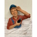 Coca Cola advertising bust of a boy holding a Coca Cola bottle {49 cm H x 57 cm W}.