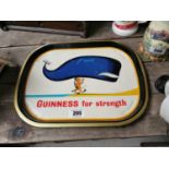 Guinness For Strength tin plate advertising drinks tray {22 cm H x 41 cm W}.