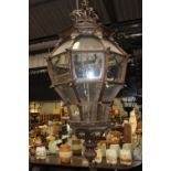 Decorative walnut glazed hanging lantern in the French style. {187 cm H x 80 cm Diam}.