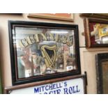 Guinness framed advertising mirror {36 cm H x 47 cm W}.