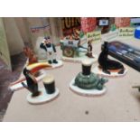 Set of six Guinness Carlton ware advertising figures {Largest 10 cm H x 14 cm W x 5 cm D}.