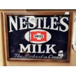 Nestlé's Swiss Milk The Riches in Cream enamel framed advertising sign. { 48cm H X 63cm W }.