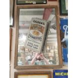 Ogden's Guinea Gold cigarettes advertising mirror. { 98cm H X 68cm W }.