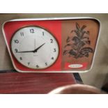1950's Carroll's No 1 advertising clock. {32 cm h x 23 cm W}.