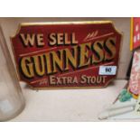 We Sell Guinness Extra Stout on board advertising sign {18 cm H x 28 cm W}.