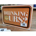 Drinking Ours Guinness Perspex advertising sign {18 cm H x 26 cm W}.