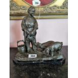 Bronze figure of Gentleman Feeding Pigs mounted on marble base {31 cm H x 30 cm W x 14 cm D}.