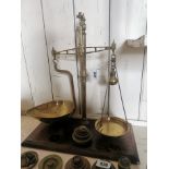 19th. C. brass grocer's beam scales on mahogany base { 58cm H X 51cm W X 26cm D } with set of six