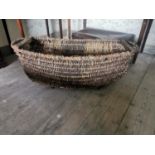 19th. C. wicker and wood oval basket { 37cm H X 105cm W X 49cm D }