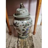 Pair of Oriental decorative ceramic lidded urns with Foo Dog {63 cm H x 30 cm Dia.}.