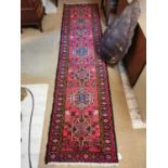 Good quality Persian carpet runner {280 cm L x 65 cm W}.