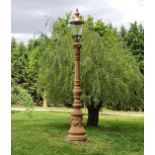 Pair of good quality moulded sandstone avenue lamps with copper lights {330 cm H x 50 cm Dia.}.