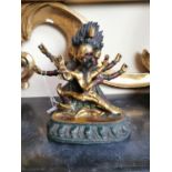 Gilded and painted metal three headed Buddhist Deity - Hands and Heads - standing on a Lotus