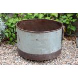Metal planter of round form with handles { 33cm H X 52cm Dia }.