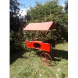 Vintage Le Creuset Barbecue with canopy in tradional le creuset red colour and metal spoke wheels {