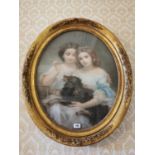 19th C. oil on canvas of Children and dog mounted in oval giltwood frame {100 cm H x 70 cm W}.