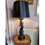 Decorative bronze table lamp surmounted with three figures {53 cm H x base 22 cm Dia and shade 43 cm