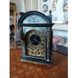 Early 19th. C. ebonised mantle clock inlaid with brass and silver, the brass dial with Roman