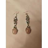 Pair of silver and rose quartz drop earrings.