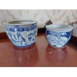 Two Oriental blue and white jardinieres.