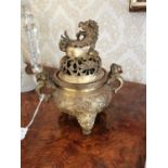 Chinese Buddhism brass incense burner decorated with flora, the handles in the form of Foo Dog and