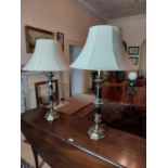 Pair of good quality brass and painted metal table lamps {100 cm H x 60 cm Dia.}.