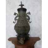 Bronze Oriental lidded pot decorated with birds and dragons {34 cm H x 15 cm Dia.}.