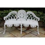 Decorative aluminium garden seat in the Coalbrookdale style { 85cm H X 140cm W X 40cm D }.