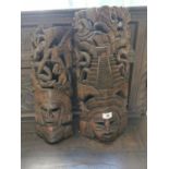 Two wooden African masks { 60cm H X 25cm W & 54cm H X 22cm W }