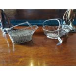 Two early 20th C. silverplate wine bottle holders {Approx. 19 cm H x 26 cm W x 11 cm D}.