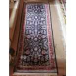 Good quality Persian carpet runner {210 cm L x 82 cm W}.