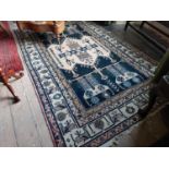Decorative Oriental tribal carpet square {240 cm L x 146 cm W}.