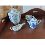 Four pieces of Oriental blue and white ceramics.