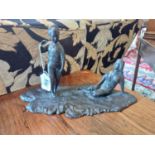 Bronze figural group of a Boy and Girl mounted on a wooden plinth {23 cm H x 36 cm W x 18 cm D}.