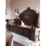 Good quality profusely carved mahogany bed {219 cm H x 248 cm W x 230 cm D}.
